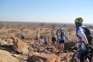 northern tuli botswana cycling safari team on hill