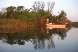 okavango delta botswana fishing boat along river