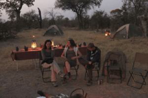 selinda spillway walking safari camp tents and campfire