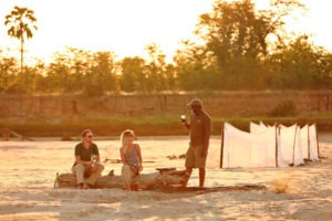 zambia south luangwa walking safari sunset drinks at sleepout
